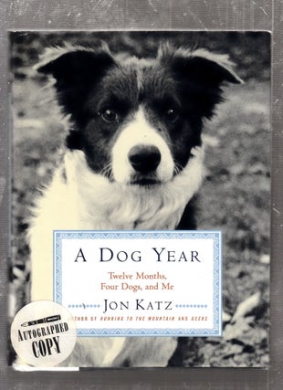 Item #E26113 A Dog Year: Twelve Months, Four Dogs, and Me (signed by the author). Jon Katz