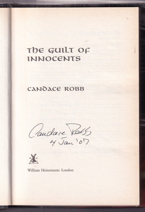 Item #E32086 A Guilt of Innocents: An Owen Archer Mystery (true UK first edition SIGNED). Candace...